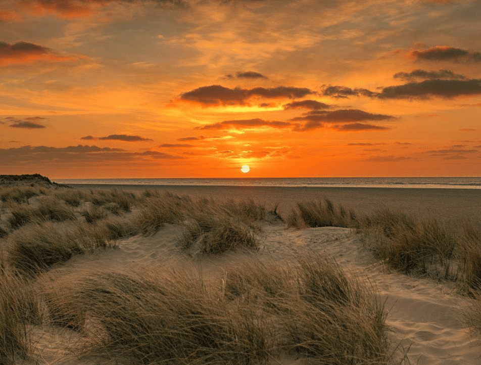 Sunset over a sandy beach